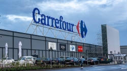 Carrefour vinde magazinele din România fraților Pavăl pentru circa 823 mil. euro