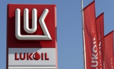 Lukoil își vinde activele din afara Rusiei către Carlyle Group