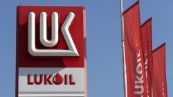 Lukoil își vinde activele din afara Rusiei către Carlyle Group